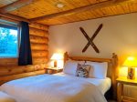 Bedroom with queen and twin beds.